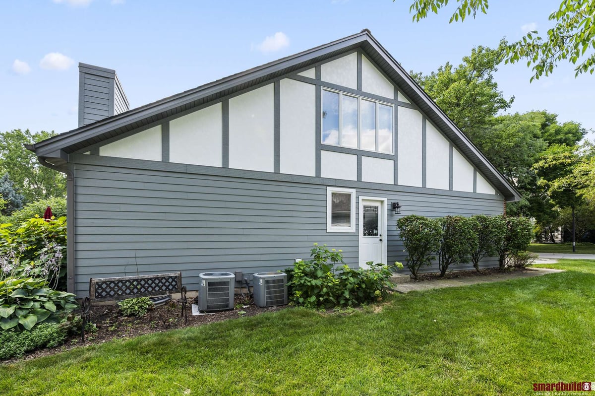 Home exterior with blue and white siding